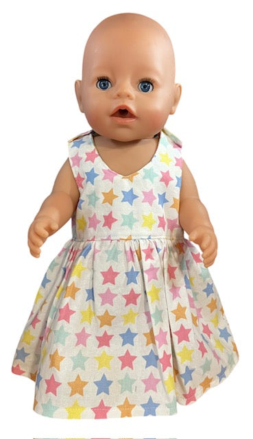 Pastel Rainbow Stars Dolls Dress with velcro. Suits 43cm doll (as shown)