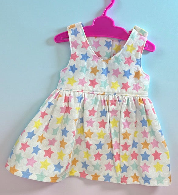 Pastel Rainbow Stars Dolls Dress with velcro. Suits 43cm doll (as shown)
