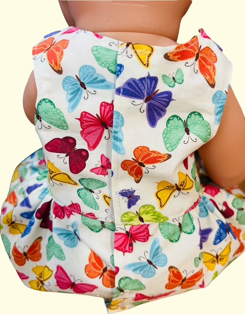 Butterfly dolls dress. Fits 43cm baby born doll (as shown)