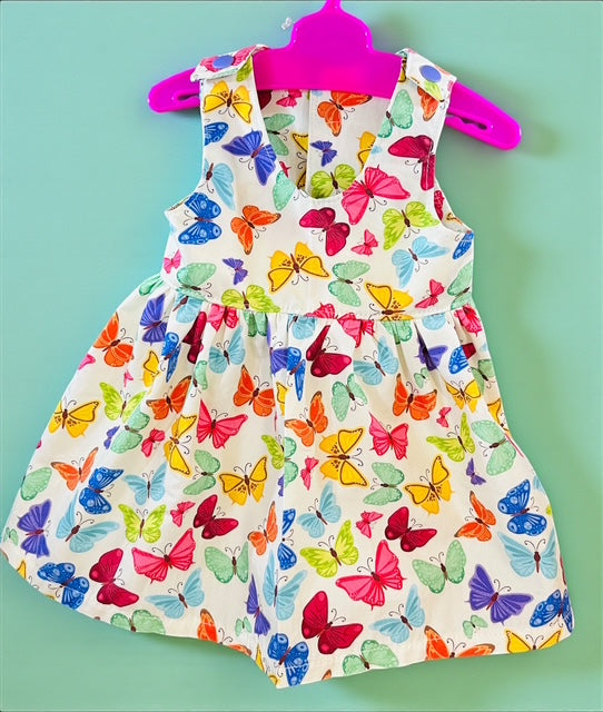 Butterfly dolls dress. Fits 43cm baby born doll (as shown)