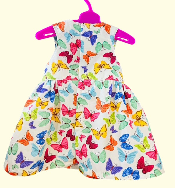 Butterfly dolls dress. Fits 43cm baby born doll (as shown)
