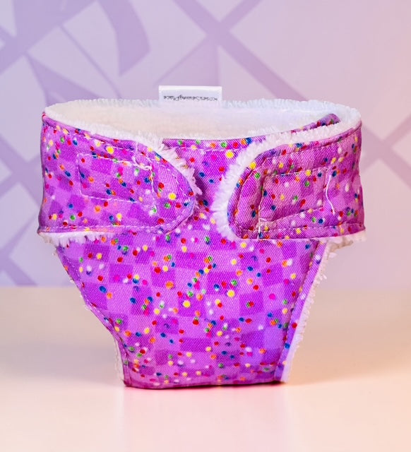 Confetti Purple Doll Nappy. Fits 32cm Mini Lands Doll (as shown)