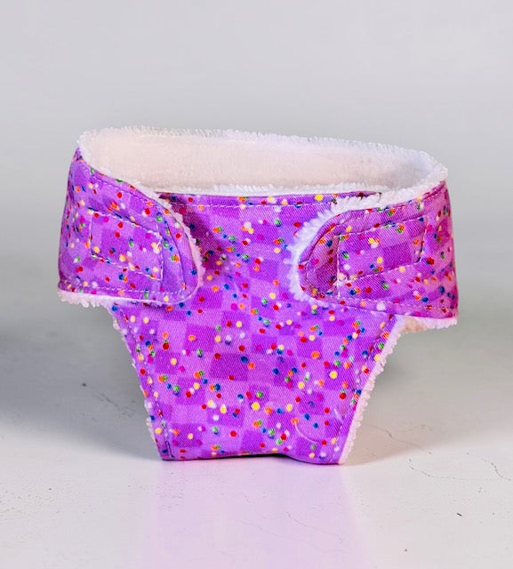 Confetti Purple Doll nappy. Fits 38cm Minilands Doll (as shown).